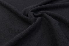 the black fabric is very soft and has no pattern on it's surface,