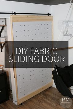 a diy fabric sliding door in a room