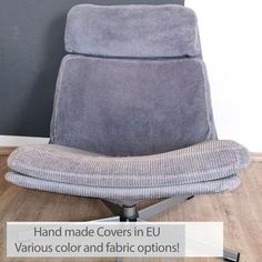 an office chair with the words hand made covers in eu various color and fabric options