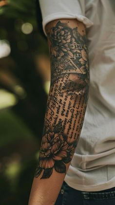 Close-up of a person's arm with an intricately designed tattoo sleeve featuring nature and floral motifs. Script Tattoo, Script Text, Tattoo Script, Tattoo Sleeve, Elegant Floral, Floral Motifs, Floral Motif, Nature Inspired