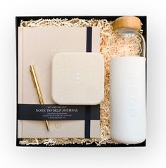 a note to self journal in a gift box with a pen, notebook and salt shaker