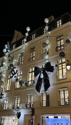 a large building decorated with christmas lights and decorations