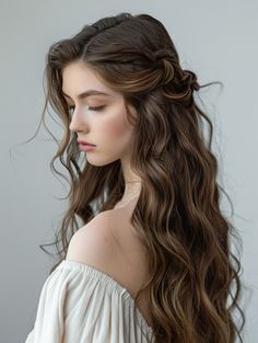 Long waves with a twisted half-updo offer a romantic and elegant look that’s perfect for weddings or formal events. The waves add texture and movement, while the twisted half-updo adds a touch of sophistication. This style works well for those with any face shape and hair type. Wedding Glamour Waves, Pretty Hairstyles For Long Hair, Elvish Hairstyles, Hairstyles With Curls, Long Wedding Hairstyles, Bridesmaid Hair Inspo, Lux Series, Bridal Hair Down, 1950s Hairstyles