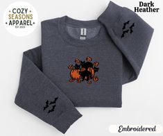 Embroidered Black Cats and Pumpkins with Upper Bat Sleeves Halloween Sweatshirt * Product Details - Embroidered - Unisex Sweatshirt - Designed with pre-shrunk soft air-jet spun yarn - Features a crewneck - Double-needle stitched collar, shoulders, armholes, cuffs and hem - Loose fit for a comfortable feel * Sizing and Colors - Please refer to sizing and color charts in the images * Fabrication - 50% cotton, 50% polyester * Care Instructions - Turn inside out and machine wash cold on delicate cycle - Dry on low heat setting - Do not bleach - Do not dry clean - Do not iron directly on design * Processing and Shipping Times - Please allow 2-10 business days for your order to be processed and made - Standard shipping takes 3-5 days - Please note that these times are estimated by USPS and may t Cats And Pumpkins, Bat Sleeves, Bat Sleeve, Soft Air, Halloween Sweatshirt, Color Charts, Black Cats, Sweatshirt Designs, On Design