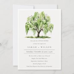 a watercolor painting of a tree with green leaves on it is shown in the center of this wedding card