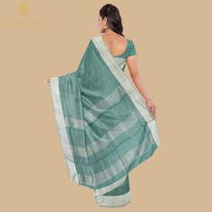 Khinkhwab brings you Maheshwari Sarees. Maheshwari handlooms owe their name to Maharani Ahilyabai Holkar, the ruler of the state of Indore in the late 18th century. Her reign was deemed the Golden Age, and she is revered by all at Maheshwar as Devi Ahilyabai or Ma Saab till date. Maheshwari handlooms derived their fine simplicity from this icon. It is said that under her artistic guidance, the craftspeople made light fabrics, detailed with motifs derived from carvings on the Maheshwar fort- a de Handloom Slub Silk Pre-draped Saree For Ceremonies, Handloom Slub Silk Pre-draped Saree For Traditional Ceremonies, Traditional Slub Silk Blouse Piece With Border, Transitional Cotton Silk Traditional Wear For Rituals, Traditional Green Pre-draped Saree With Border, Green Saree For Rituals And Festive Occasions, Festive Green Saree For Rituals, Traditional Slub Silk Wear With Border, Green Traditional Wear With Zari Weaving For Rituals