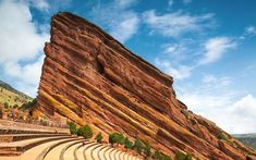 a large rock formation with steps leading up to it