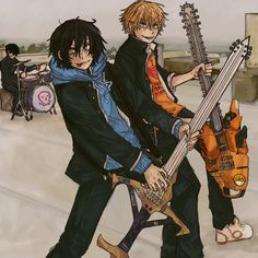 two young men are holding guitars in their hands