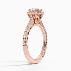 Tacori Petite Crescent Bloom Diamond Engagement Ring - 18K Rose Gold. A halo of diamonds surrounds a glistening center stone encased by double bead prongs in this eye-catching ring. Diamond-accented cathedral shoulders and petite crescents along the side of the band add a glamorous, unique flai. The style of this piece allows wedding rings to sit perfectly flush against the band (2/5 total carat weight). 
 
 Our perfect fit engagement rings are carefully designed to sit flush against a variety o Diamond Ring With Halo Setting For Proposal, Diamond Halo Ring For Wedding Proposal, Luxury Lab Grown Diamond Ring With Halo Setting, Rose Gold Wedding Ring With Center Stone Round Cut, Luxury Rings With Halo Setting And Lab Grown Diamond, Luxury Diamond White Ring With Halo Setting, Luxury Diamond White Diamond Ring With Halo Setting, Exquisite Moissanite Ring With Halo Setting For Wedding, Exquisite Rose Gold Diamond Ring With Brilliant Cut