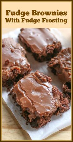 chocolate fudge brownies with fudge frosting on a white paper towel and text overlay that reads fudge brownies with fudge frosting