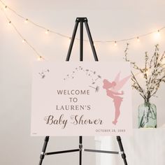 a welcome sign for a baby shower is displayed