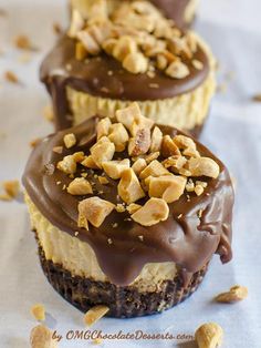 three chocolate peanut butter cheesecakes with nuts on top and the title above it