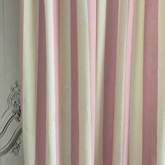 a curtain with pink and white stripes on it