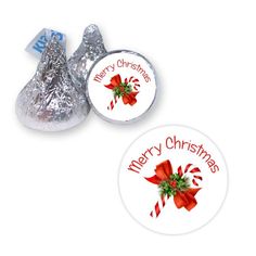 two herspooos wrapped in foil with the words merry christmas on it and a bow