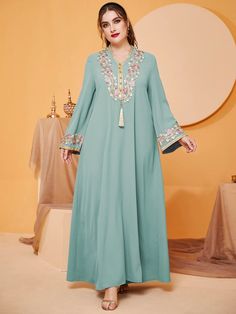 Plus Floral Embroidery Tassel Trim Dress | SHEIN USA Elegant Long Sleeve Kaftan With Tassels, Traditional Long Sleeve Kaftan With Tassels, Long Sleeve Kaftan With Tassels For Spring, Long Sleeve Spring Kaftan With Tassels, Festive Green Dress With Tassels, Festive Green Tassel Dress, Long Sleeve Embroidered Dress For Eid, Festive Long Sleeve Dress With Tassels, Bohemian Tassel Dress For Eid