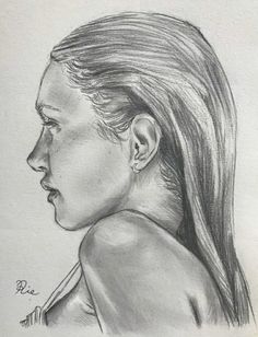 a pencil drawing of a woman's profile