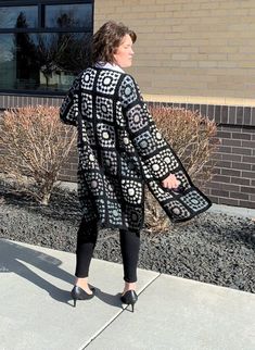 Oversized Granny Square Cardigan For Fall, Oversized Fall Cardigan With Granny Square Details, Winter Black Outerwear With Granny Square Details, Crochet Outerwear For Winter Layering, Winter Crochet Outerwear For Layering, Black Granny Square Winter Cardigan, Black Granny Square Cardigan For Winter, Black Granny Square Outerwear For Winter, Black Granny Square Sweater For Fall