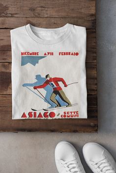 Keywords: UNISEX Vintage Skiing T-Shirt | Ski Lover Hoodie | Skier Sweatshirt, Winter Sports Tee, Asiago Italy Top, Snow Mountain Shirt, Snowboarding Dad Gift Snowboard shirt Ski sweater skier accessories ------------------------------------------------ QUALITY This T-shirt is a UNISEX t-shirt with a vintage illustration and it feels soft and light, with just the right amount of stretch. It features a crew neck, pre-shrunk fabric and side-seamed fit. FIND YOUR SIZE Please find the fitting guide in the pictures to determine your size. Pro Tip: Choose the best size by comparing the measurements of your favorite T-Shirt with the ones listed on the chart. SHIPPING We work with a reliable, high-quality print-on-demand partner with locations in US and the EU, so depending on the destination your Ski Print Sweater, Ski Graphic Tee, Snowboard Shirts, Ski Shirt, Vintage Skiing, Ski Print, Ski Shirts