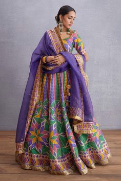 Navratan lehenga with geometric printed motifs, placement embroidered stripes and side tassel tie-up. Paired with printed, embroidered blouse and amethyst purple fringe bordered dupatta.
Components:3
Printed
Neckline:Sweetheart
Sleeve Length:Short
Fabric:Lehenga: Handwoven Chanderi, Pure Cotton Silk, Dupion; Blouse: Handwoven Chanderi, Pure Cotton Silk; Dupatta: Original Organza Silk, Pure Cotton Silk
Color:Multi Color
Fringe dupatta
Back and side tassel tie-up
Cutwork bordered blouse
Geometric Bohemian Chanderi Choli For Wedding, Festive Purple Sharara With Motifs, Bohemian Purple Sets With Zari Work, Bohemian Cutdana Anarkali Set For Wedding, Bohemian Sharara With Motifs For Wedding, Bohemian Anarkali Set For Wedding With Cutdana, Multicolor Anarkali Set With Dori Work For Transitional Season, Bohemian Wedding Sharara With Motifs, Bohemian Wedding Lehenga With Cutdana