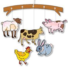 several farm animals are hanging from a wooden beam with an arrow on the top and bottom