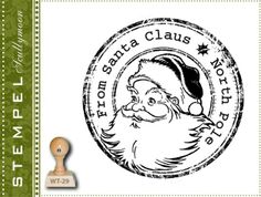 a rubber stamp with the words from santa claus to north pole and a reindeer running through it