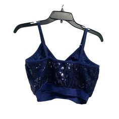 Kelle Womens Size Large L Sports Sequined Bra Top Shirt Crop Blue K8T7 85% Nylon 15% Lycra Features: * Sports Bra Size: Womens L Casual Blue Tops For Gym, Fitted Summer Training Top, Navy Moisture-wicking Tops For Training, Navy Sports Tops For Summer, Navy Moisture-wicking Tops For Sports Season, Fitted Tops For Summer Training, Fitted Tops For Training In Summer, Blue Nylon Sports Bra, Sleeveless Blue Nylon Sports Bra