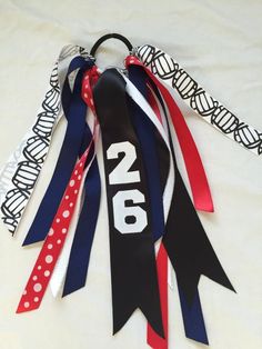 ribbons with the number 26 on them