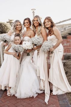 a group of women standing next to each other