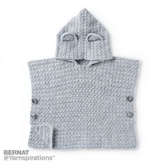 a crocheted hooded sweater with buttons on the chest and hood is shown in grey