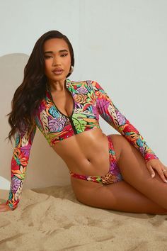 Available In Blue/combo. 2 Piece Bikini Long Sleeve Crop Top Zip Up Mock Neck Removable Cups Bikini Bottom High Waist High Leg Cut Full Stretch Final Sale Disclaimer: Print Placement May Vary Shell: 88% Polyester 12% Spandex Lining: 100% Polyester Imported | Surf All Day Long Sleeve 2 Piece Bikini size Small by Fashion Nova Multicolor Long Sleeve Swimwear For Pool, Trendy Long Sleeve Multicolor Swimwear, Trendy Multicolor Long Sleeve Swimwear, Trendy Fitted Multicolor Tankini, Vibrant Fitted Swimwear For Beach Party, Two Piece Swimwear, Print Placement, Long Sleeve Crop, High Leg