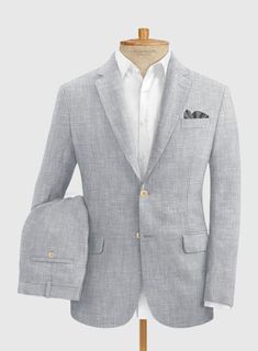 Maintain a distinct professional appearance by adding an extra bit of flair with our Italian Zod Light Gray Linen suit. Crafted from linen, this suit will keep you cool, sharp and stylish in summers. Combine it with a matching waistcoat, a crisp white and brown derby shoes.     Look Includes  Italian Zod Light Gray Linen Fabric  Two Button Jacket Style  Notch Lapel   Corozo   Beige  Buttons  Single Vent  Three Cuff Buttons  Two Welted Back Pockets on Trousers     You can change the look during c Light Grey Tweed Suit, White Linen Suit, Green Velvet Jacket, Chevron Pants, Royal Blue Suit, Brown Derby