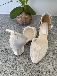 "Classic Wedding comfortable block 2 1/4\" heel shoes, front lace and satin heel adorned with a beautiful beaded with pearls edging embellishment, please look at the pictures. available in sizes: 5M to Please look at all the pictures! contact for additional questions, or concerns. NO RETURNS NO EXCHANGES, FINAL SALE, PLEASE CONTACT FOR ANY QUESTIONS CONCERNS." Elegant Low Heel Wedding Shoes With Lace Trim, Lace Low Heel Wedding Shoes, White Lace Wedding Shoes With Pointed Toe, Lace Wedding Shoes With Almond Toe, Closed Toe Wedding Shoes With Lace Trim, Cream Lace Pointed Toe Wedding Shoes, White Lace Ankle Strap Wedding Shoes, White Lace Wedding Shoes With Ankle Strap, Formal Wedding Shoes With White Laces And Closed Toe