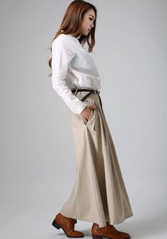 "A casual women skirts in Khaki, If you're looking for a long skirt made by linen , this pleated front and flap detail skirt will be your choice . * Details * * Soft Linen fabric * Hide zipper in the front side * Pleated on the waist * Twin side pockets with Flap detail * Back flap detail with no pocket . * More color and More size https://www.etsy.com/listing/195905616 NOTE Please leave us your body measurement When you Place an order, they will help us check the size and ship your package. Wai Baggy Pleated Maxi Skirt, Spring Baggy Lined Maxi Skirt, Spring Full-length Baggy Skirt, Baggy Long Gathered Skirt, Baggy Full-length Skirt For Spring, Baggy Wide Leg Maxi Skirt For Fall, Beige Gathered Maxi Skirt, Baggy Long Skirt With Pockets, Chic Flared Linen Maxi Skirt