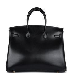 This Birkin in Black boxcalf leather with gold hardware has tonal stitching, front flap with two straps, front toggle closure, clochette with lock and two keys, and double rolled handles The interior is lined with Black chevre and features one zip pocket with an Hermes engraved pull.Collection: AOrigin: FranceCondition: Never worn (plastic on hardware)Accompanied by: Hermes box, dustbag, ribbon, rainhat, carebook, clochette, clochette dustbag, lock, two keysMeasurements: 11" width x 13.75" height x 7" depth; 4" handle drop Luxury Everyday Calf Leather Bag With Lock, Luxury Calf Leather Bag With Lock, Timeless Calf Leather Bag With Hasp Closure, Business Bags With Lock In Calf Leather, Formal Calf Leather Bag With Lock, Classic Leather Bags With Lock, Business Bags In Calf Leather With Hasp Closure, Business Bags With Hasp Closure In Calf Leather, Hermes Birkin 35 Black