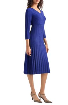 Step out in this sweater-dress decorated in textural stripes and designed in a timeless A-line silhouette that's perfect for any occasion. Surplice V-neck Three-quarter sleeves 56% acrylic, 33% nylon, 11% polyester Machine wash, dry flat Imported Elegant Jacquard Knit Midi Dress, Elegant Fitted Textured Knit Sweater Dress, Formal Fitted Jacquard Knit Dress, Elegant Formal Spring Sweater Dress, Elegant Formal Sweater Dress For Spring, Elegant Ribbed Evening Dress, Elegant Knee-length Sweater Dress For Evening, Chic Jacquard Knit Formal Dress, Elegant Blue Ribbed Sweater Dress