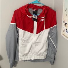 Women’s Red And White Nike Jacket Size Medium New With Tags Retail 100 Nike Red Sporty Outerwear, Red Nike Windbreaker For Winter, Nike Red Winter Windbreaker, Red Nike Casual Track Jacket, Red Nike Outerwear For Spring, Red Long Sleeve Spring Windbreaker, Nike Red Outerwear With Pockets, Red Nike Outerwear With Pockets, Casual Red Nike Windbreaker