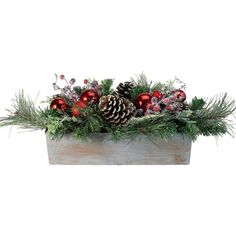 a planter filled with pine cones and ornaments