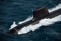 a submarine floating on top of the ocean