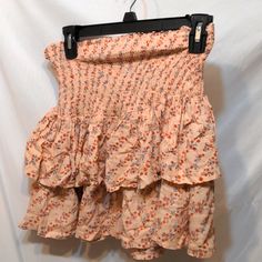 Olivaceous Pink Floral Mini Skirt Size Small New With Tags Measures 10 1/2" Across Waist But Very Stretchy Measures 16" In Length All Measurements Are On Non-stretch Mini Skirt For Summer, Spring High Waist Skirt With Elastic Waistband, Spring High-waist Skirt With Elastic Waistband, Floral Print Non-stretch High Waist Skirt, Non-stretch Tiered Mini Skirt With Lining, Spring High Waist Relaxed Mini Skirt, Spring Non-stretch Ruffled Mini Skirt, High Waist Relaxed Mini Skirt For Spring, Spring Ruffled Non-stretch Mini Skirt