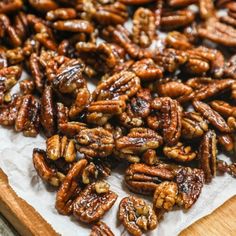 These Sweet and Spicy Pecans are perfect for snacking or for adding texture and flavor to any recipe! These spicy candied pecans are tossed in butter and sweet spices, then coated in a maple, orange, and brown sugar. Serve these spicy pecans recipe as a snack or sprinkle over mashed potatoes, baked brie, roasted veggies, or even your favorite cereal. These sweet and spicy pecans with brown sugar won't last long! Maple Pecans, Candied Pecans Recipe, Glazed Pecans, Keto Candy, Roasted Pecans, Low Carb Diets, Nut Recipes, Pecan Recipes, Thm Recipes