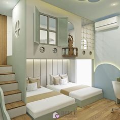 two beds in a room with wooden floors and white walls, along with a staircase leading up to the second floor