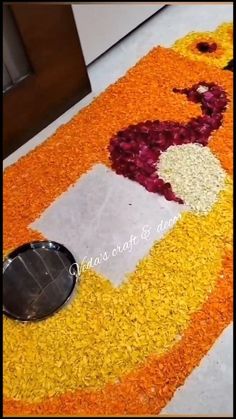 the floor is decorated with flowers and other things to decorate on it's side