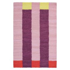 a pink and yellow striped rug on a white background