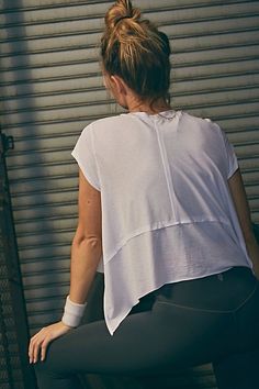 The perfect layer for all your workouts, this short-sleeve take on our favorite tee features a flowy, A-line silhouette with raw seam details and a relaxed fit. * Crewneck style * Lightweight design * Curved hemline | Tempo Short-Sleeve Tee by FP Movement at Free People, White, XL Gym Fashion Women, Modest Workout Clothes, Modest Workout, Utah Fashion, Dried Thyme, Free People Activewear, Athletic Clothes, Crewneck Style, Workout Outfits