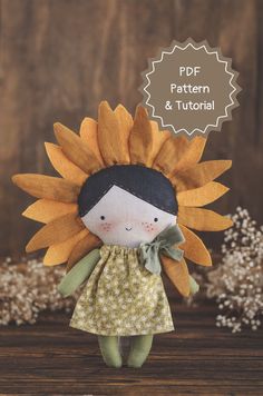 a doll with a sunflower on it's head