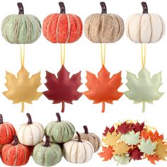 pumpkins and fall leaves hanging from strings