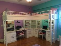 a white loft bed with desk underneath it