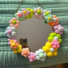 a mirror that has some flowers on it