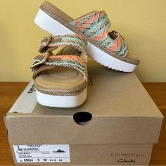 These Cute Platforms Feature Adjustable Double Buckles. Leather And Multicolor Woven Textile On The Upper. Insole Is Clean! White Sawtooth Soles For A Slip Resistant Stride. Memory Foam Footbed. They Look Brand New. 2” Heel We Are A Non Smoking Home. Tags: Beach, Sandals, Coastal, Wedge, Platform, Espadrille, Slip-Ons, Comfort, Ortholite Footbed, Casual, Boho, Bohemian, Festival Blue Casual Wedge Sandals For Beach Season, Casual Cushioned Slip-on Wedge Sandals, Casual Synthetic Wedge Sandals For Beach, Trendy Orange Wedge Sandals For The Beach, Casual Synthetic Wedge Sandals For Beach Season, Casual Multicolor Wedge Sandals For Beach, Multicolor Platform Wedge Sandals For Beach, Multicolor Wedge Heel Sandals For Vacation, Multicolor Wedge Heel Sandals For Beach