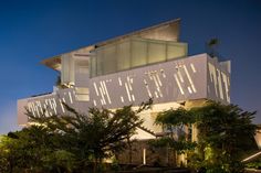 a modern building lit up at night